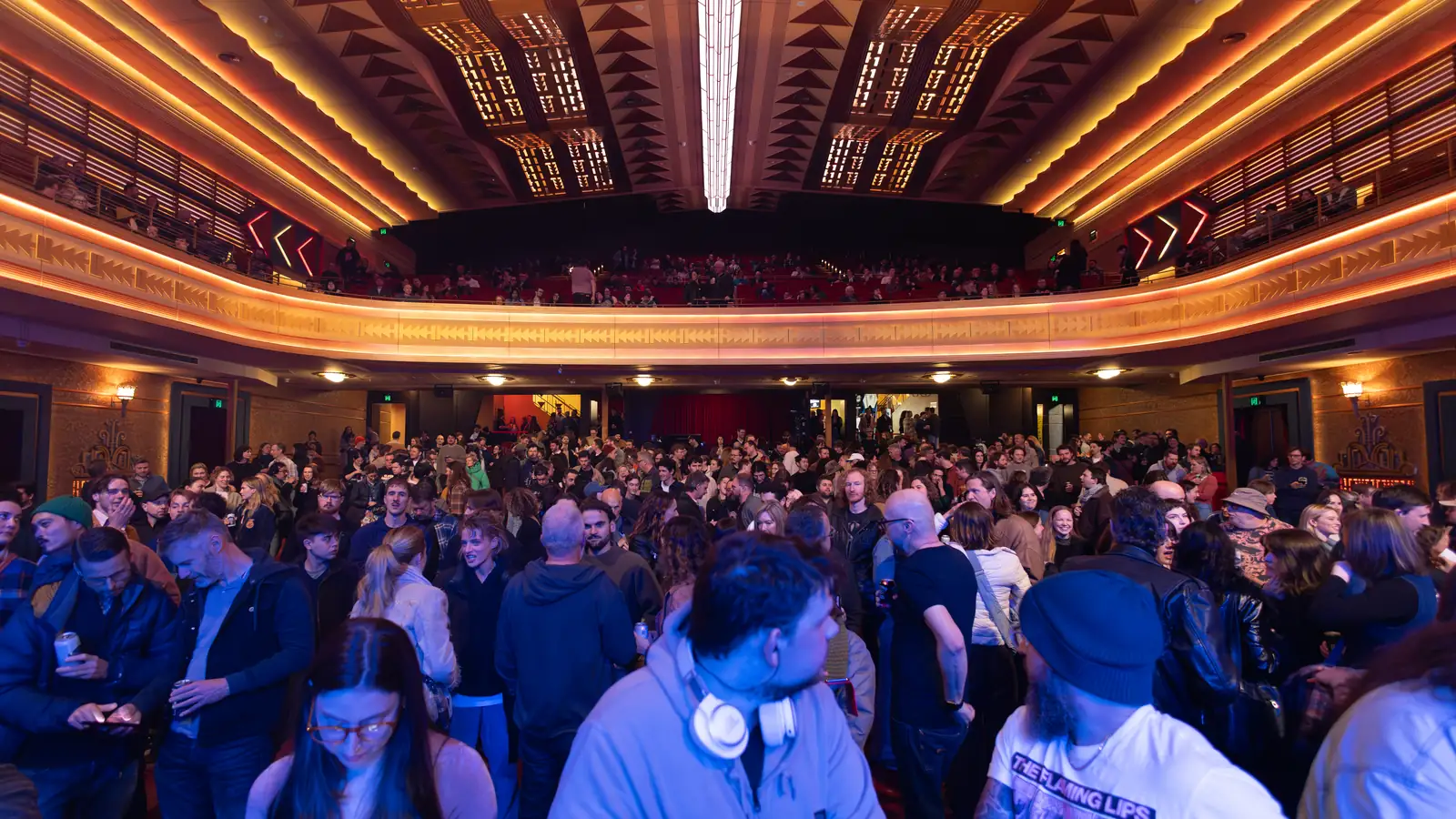 A packed theatre audience before the show, every ticket sold